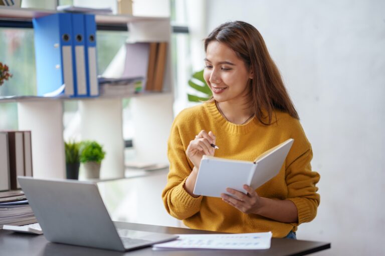 beautiful-young-asian-business-woman-working-on-her-laptop-enjoy-smiling-and-happy-working-taking-n